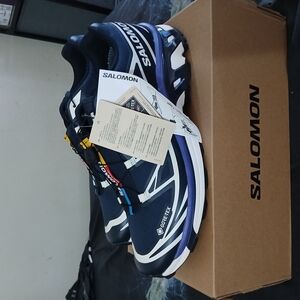 Salomon Black and White Athletic Shoes